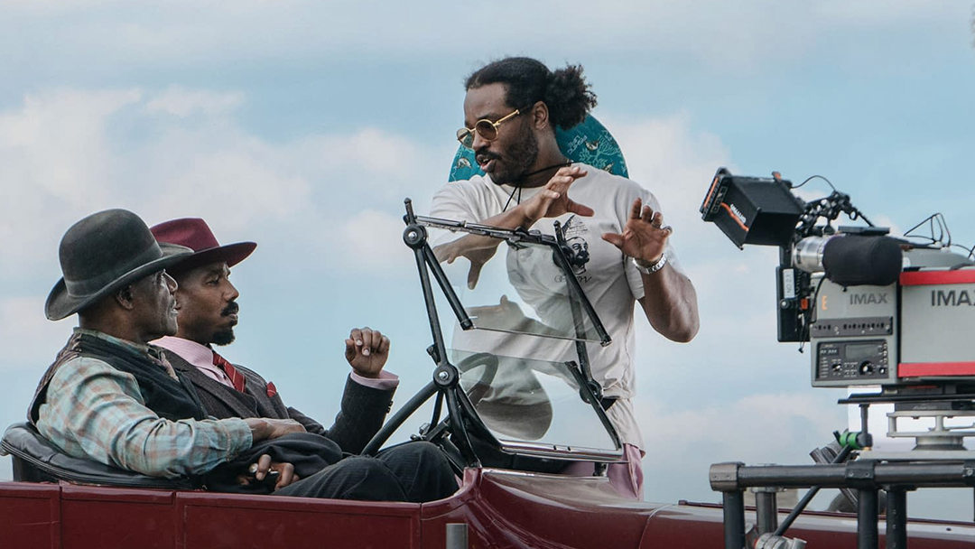 ryan coogler shooting a scene with michael b. jordan and delroy lindo